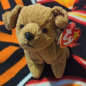 Golden Brown Plush Dog Toy with Floppy Ears and Cute Expression